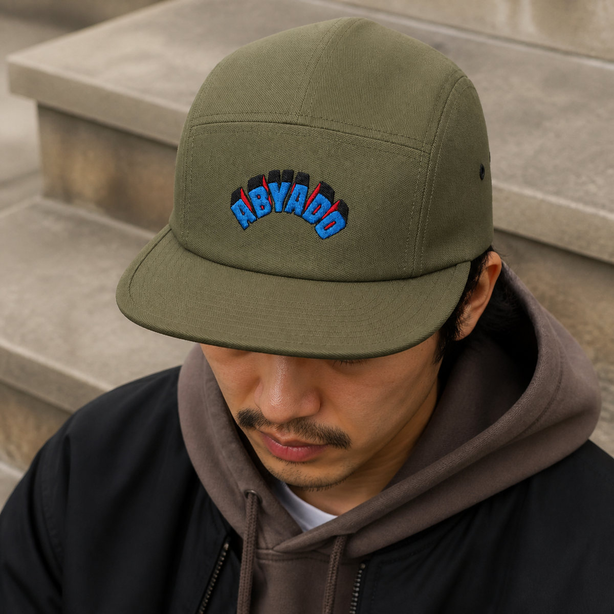 Abyado Arch Five Panel Cap lifestyle — Olive detail