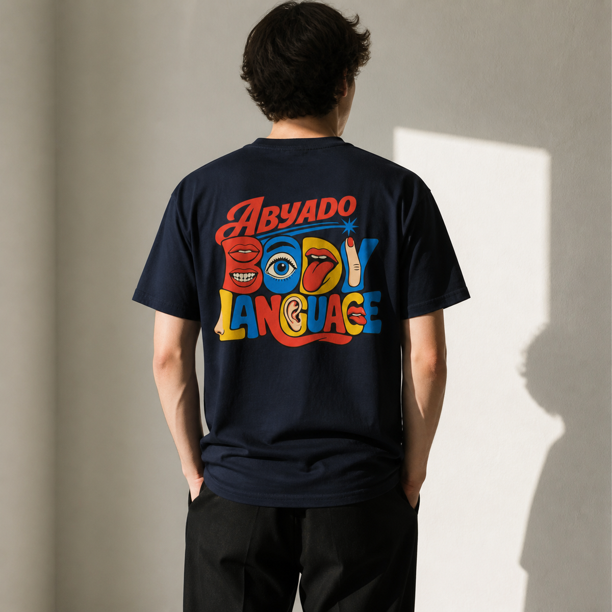 Body Language Tee back graphic natural window light