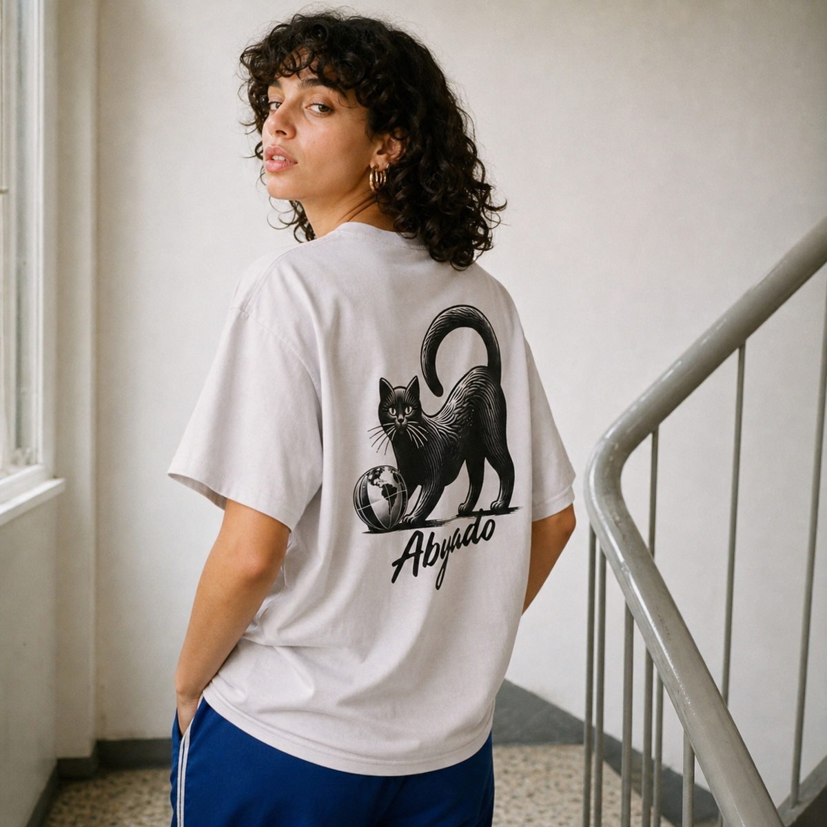 Global Play Tee in White, back lifestyle view