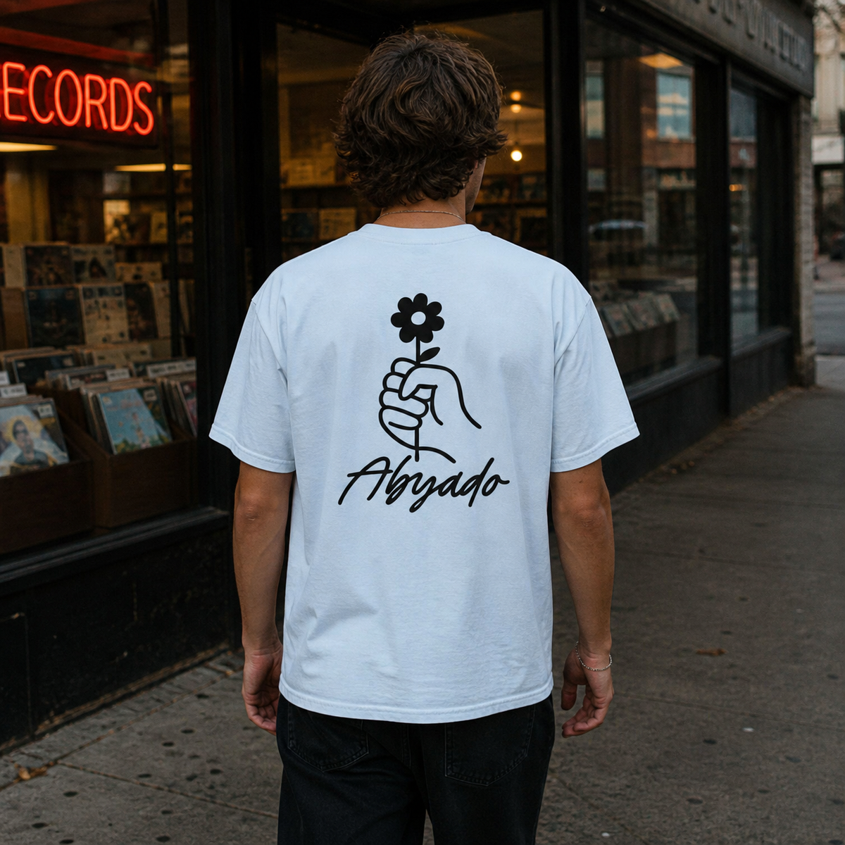 Gentle Tee lifestyle — Light Blue, back graphic