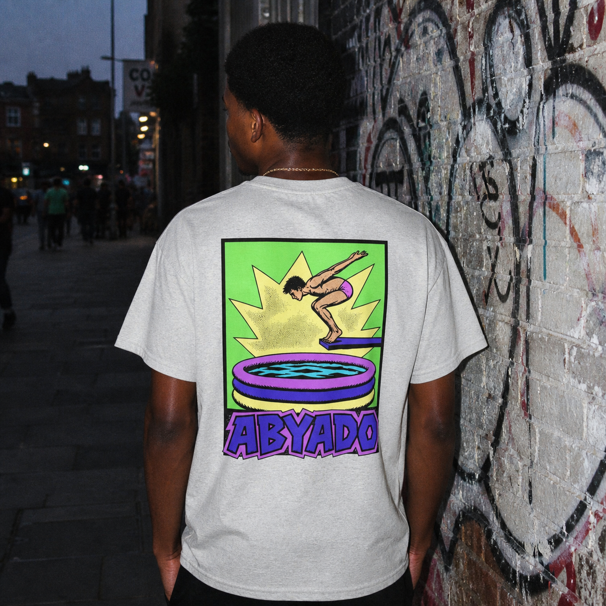 Inflatable Tee lifestyle — Ash back graphic — Brick Lane 1:1