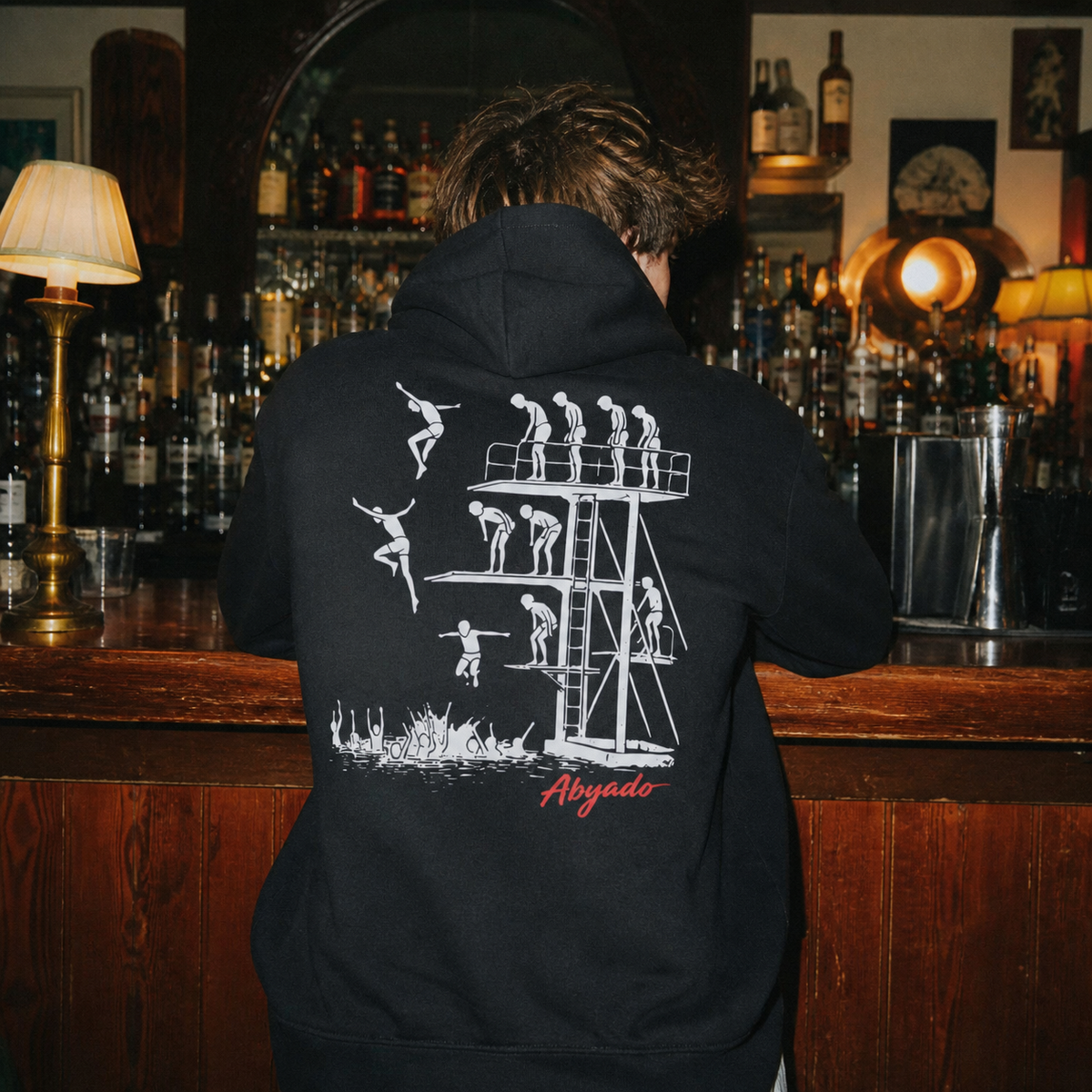Manhood Hoodie lifestyle — Black back graphic — bar 1:1