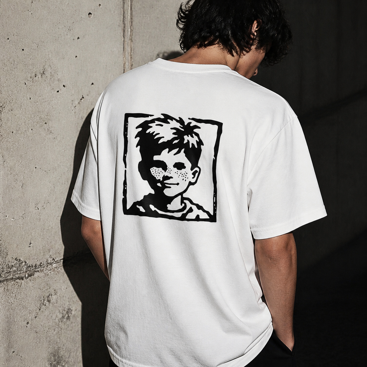 'Menace' Tee lifestyle — concrete detail