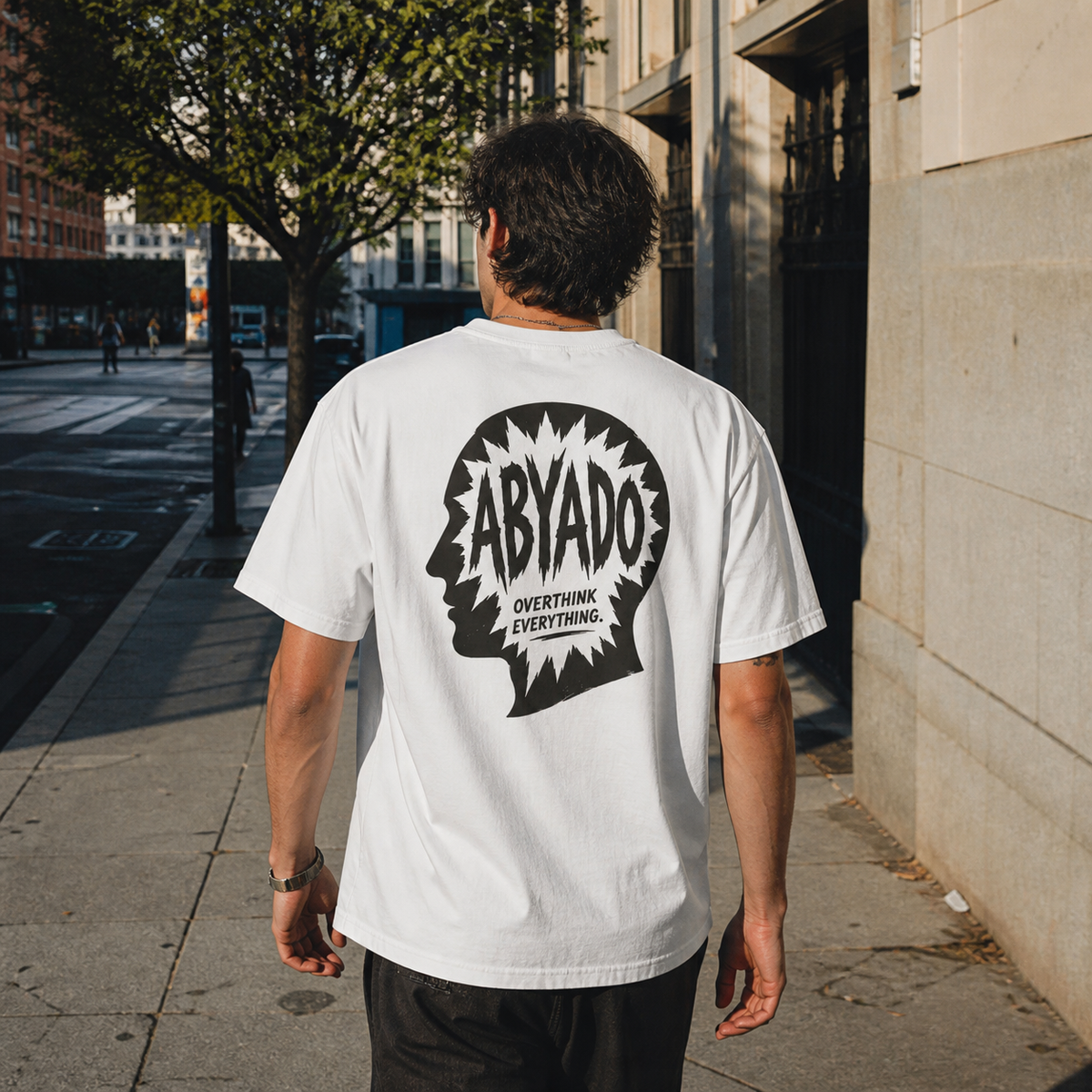 Overthink Tee lifestyle photograph showing the back graphic