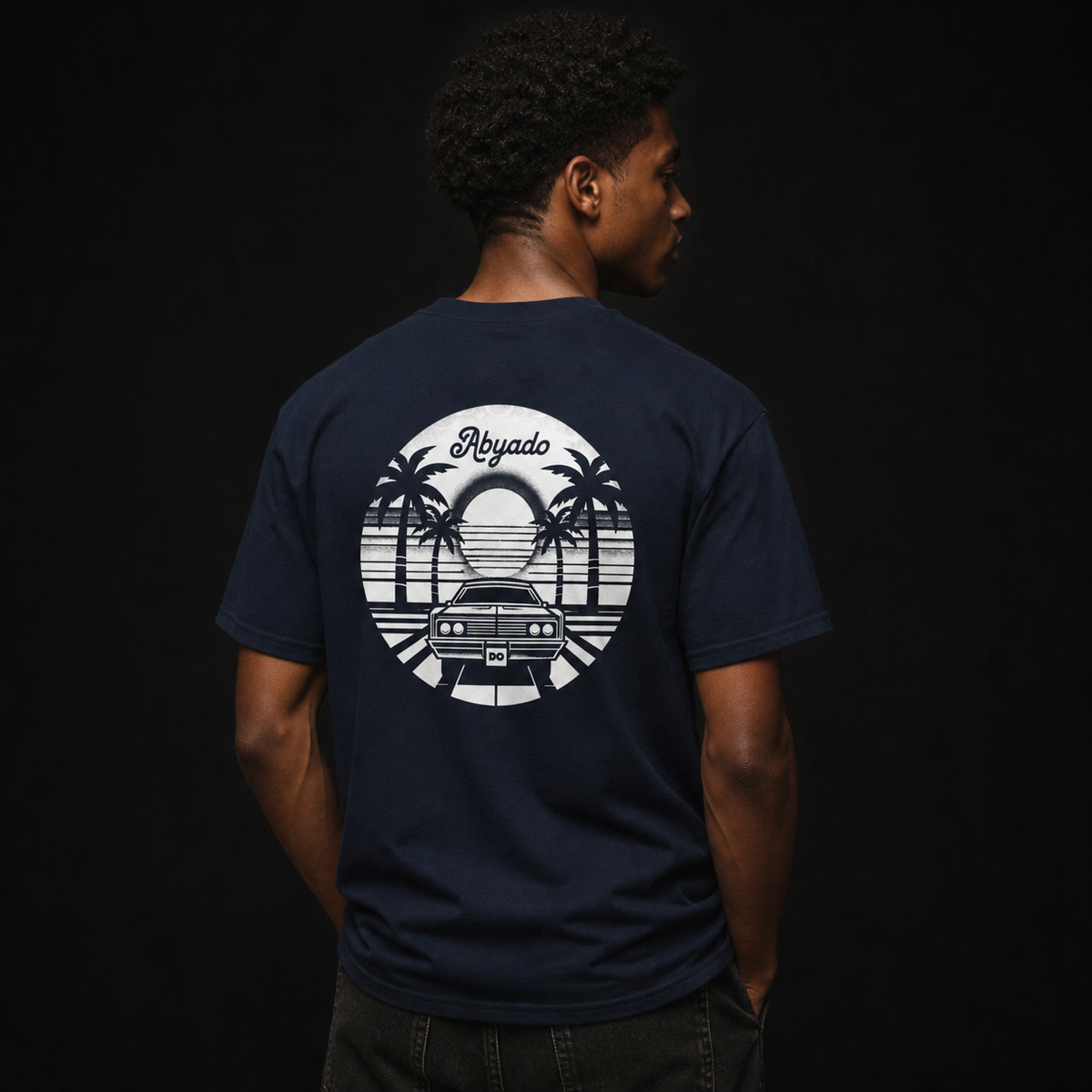 Sunset Drive Tee lifestyle — model back graphic — 1:1