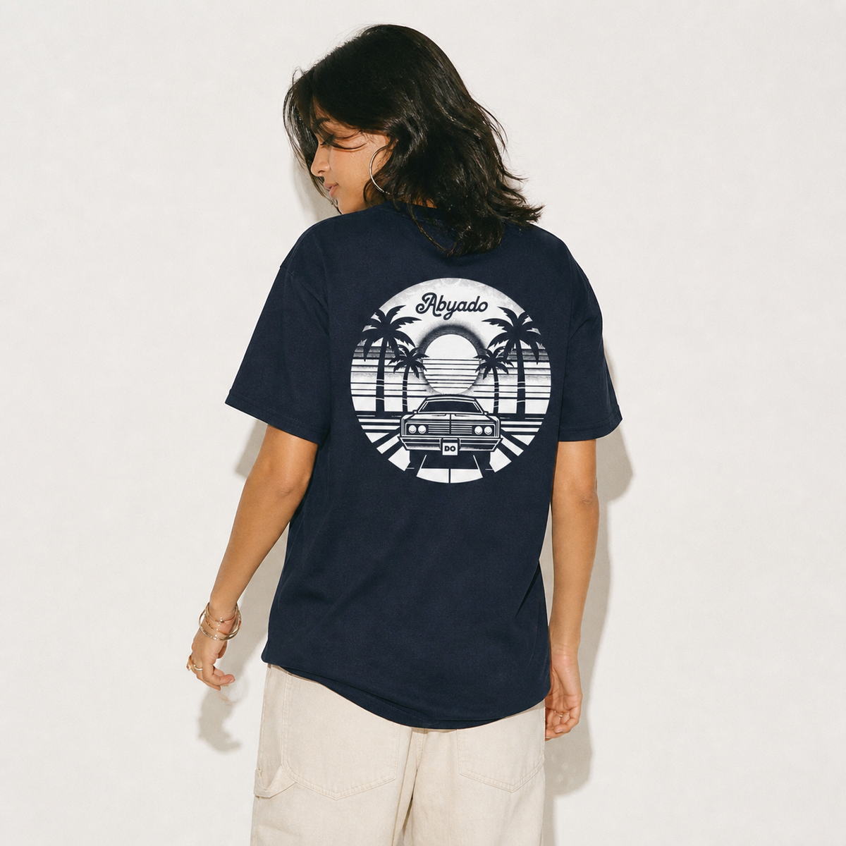 Sunset Drive Tee lifestyle — studio back graphic — 1:1