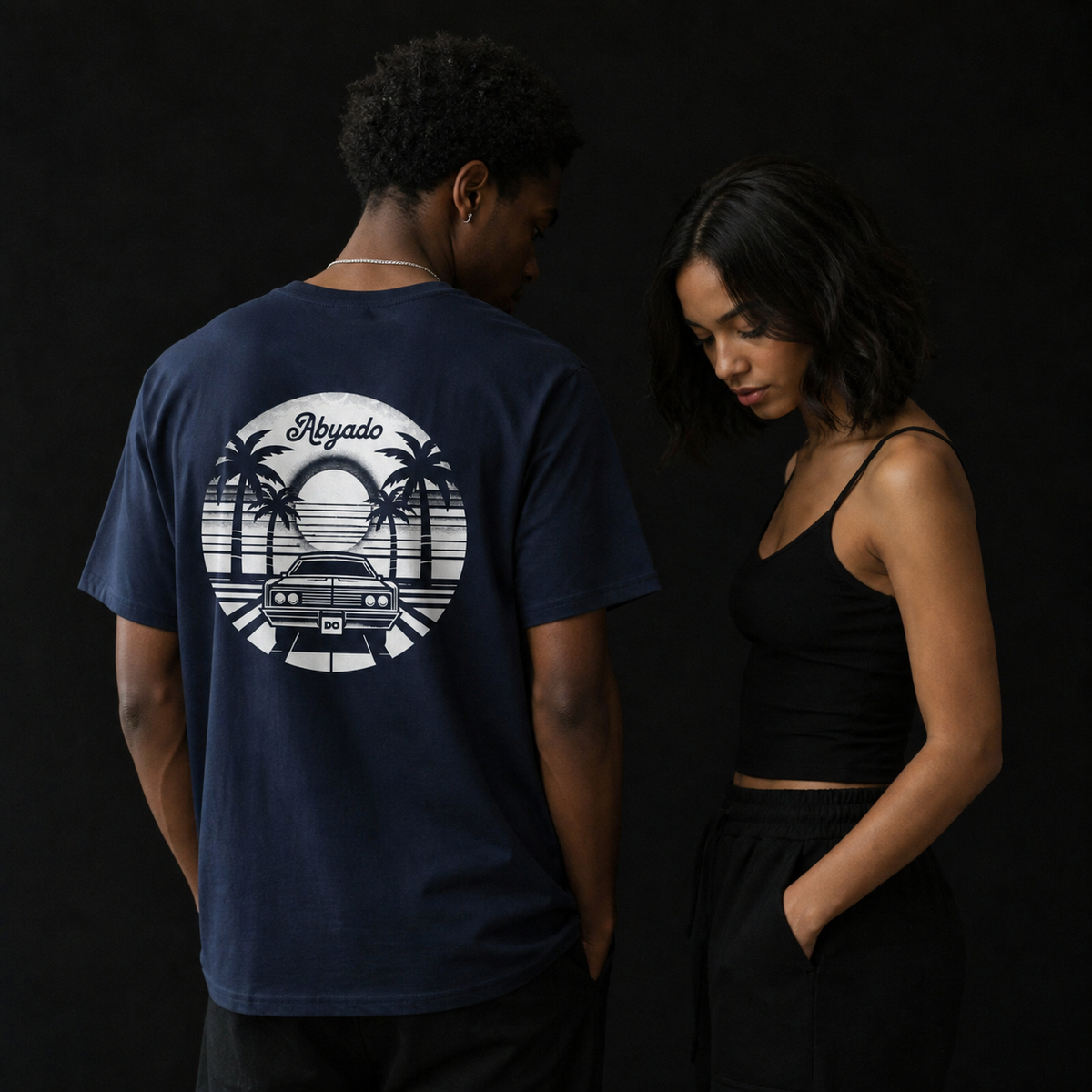 Sunset Drive Tee lifestyle — two models back graphic — 1:1