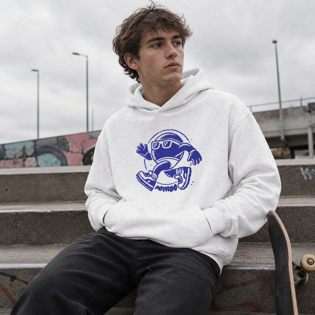 'Walking Spot' Hoodie lifestyle — white hoodie at skate spot